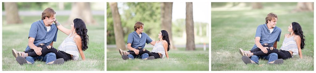 Man holding and kissing woman at Wall Lake, South Dakota during engagement session at sunset