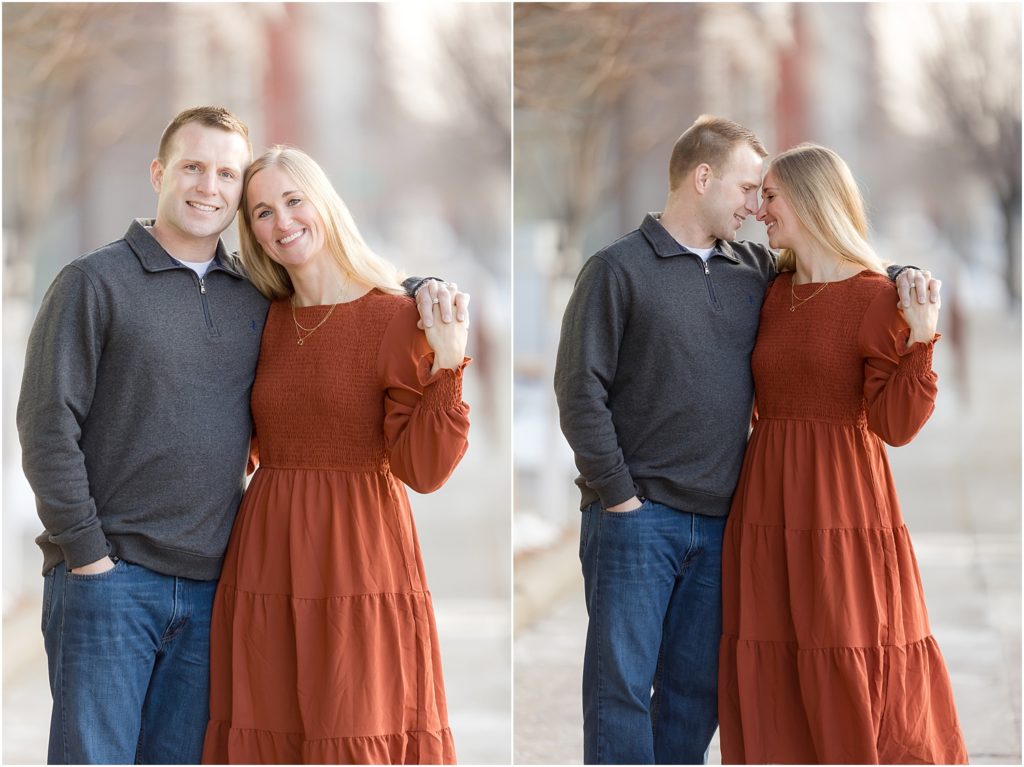 Engaged couple walking Downtown Sioux Falls during winter