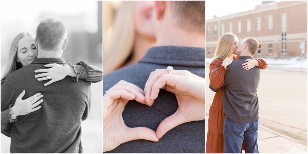 Engaged couple walking Downtown Sioux Falls during winter kissing and hugging