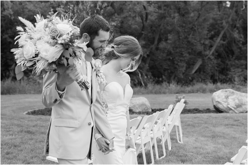South Dakota Outdoor Wedding - groom and bride walking