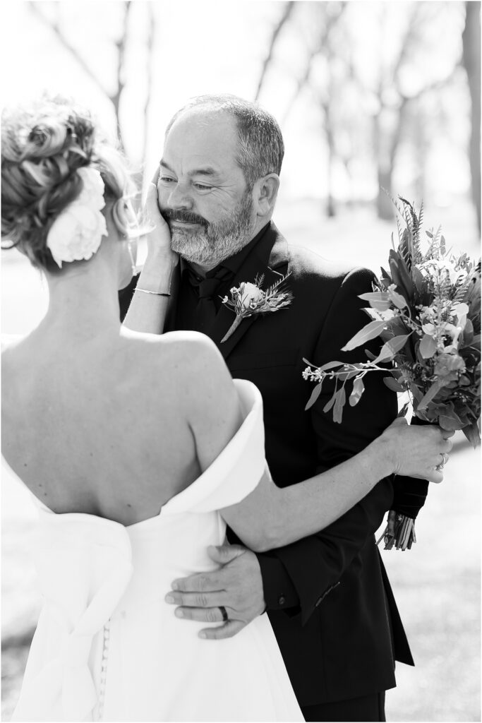 Sioux Falls Country Club Spring wedding - First Look with groom