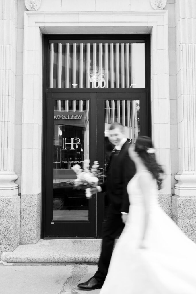 Bride and groom walking downtown Sioux Falls South Dakota